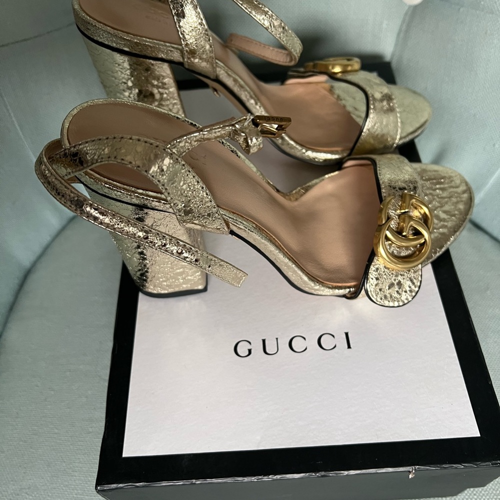 Gucci gold high heels